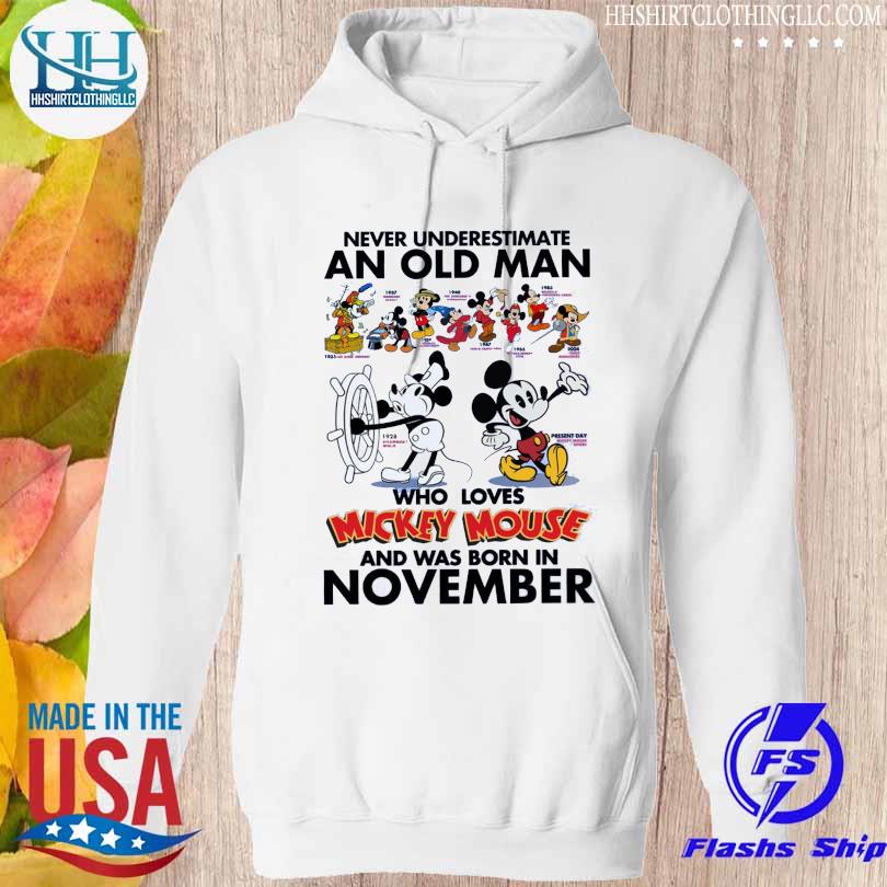 Never Underestimate an old Man who loves Mickey Mouse and was born on November 2023 s hoodie trang