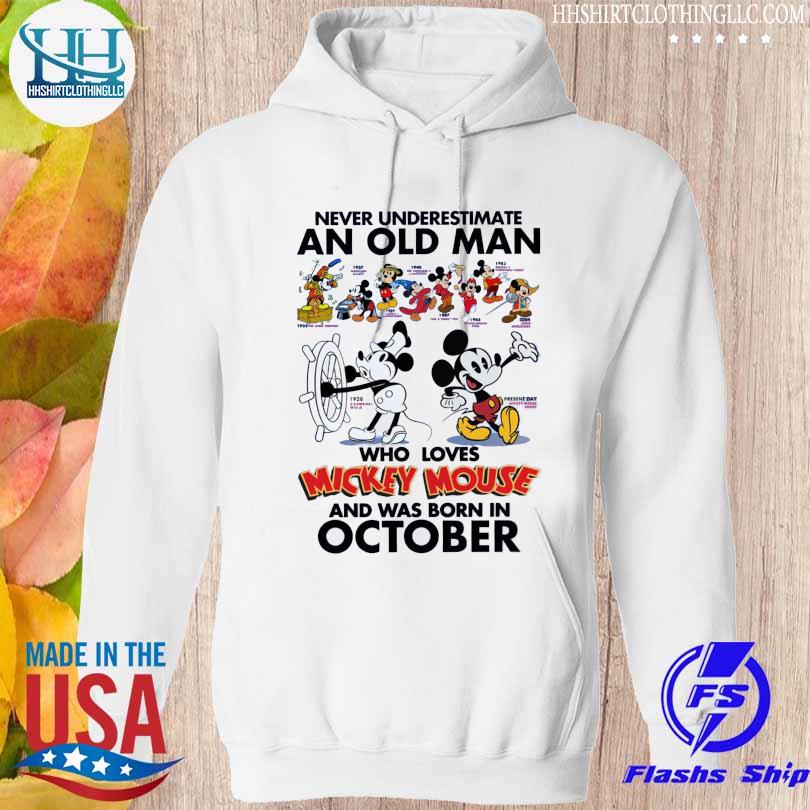 Never Underestimate an old Man who loves Mickey Mouse and was born on October 2023 s hoodie trang